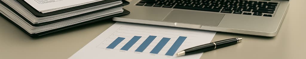 Auditor reviewing compliance software dashboard for plating shop