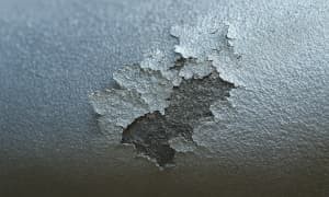 Side-by-side comparison photos of common plating defects including burning, pitting, and peeling